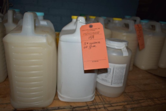 FIVE PLUS GALLONS OF GLUE IN THREE CONTAINERS
