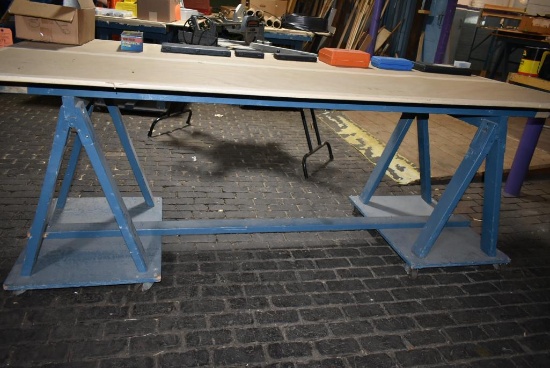 4' x 8' WOODEN WORK TABLE ON CASTERS, SAWHORSE STYLE BASE, NO CONTENTS - PICTURE IS REPRESENTATIVE