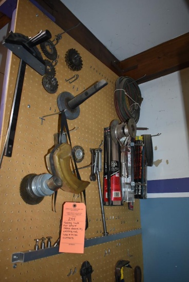 TOOLING RACK FOR BITS AND ITEMS ABOVE IT; WELDING ROD, HOSE AND MISC. CUTTERS