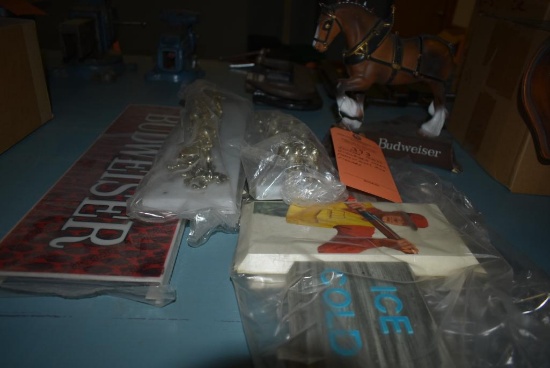 ASSORTED PLASTIC BUDWEISER SIGNS, PARTS OF SIGNS, AND FIGURES