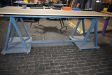4' x 8' WOODEN WORK TABLE ON CASTERS, SAWHORSE STYLE BASE, NO CONTENTS - PICTURE IS REPRESENTATIVE
