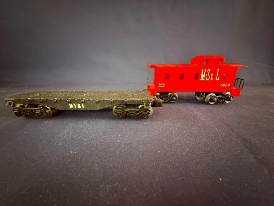 LIONEL O GAUGE M ST.L 6059 CUPOLA CABOOSE AND LIONEL DT-I SHORT BLACK FLAT CAR