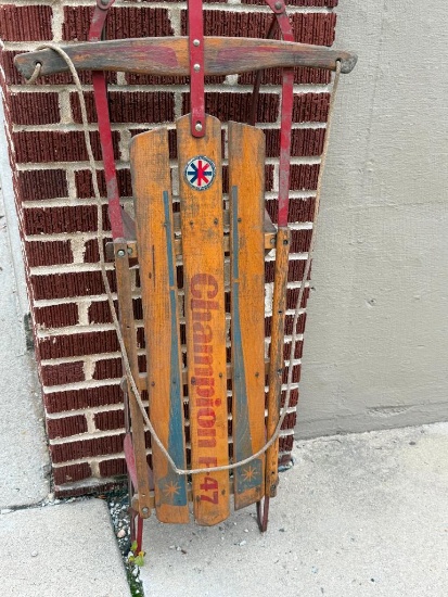 CHAMPION F-47 WOODEN SLED WITH METAL RUNNERS AND ROPE TO PULL, APPROX. 47" LONG, HANDLE, STEERING