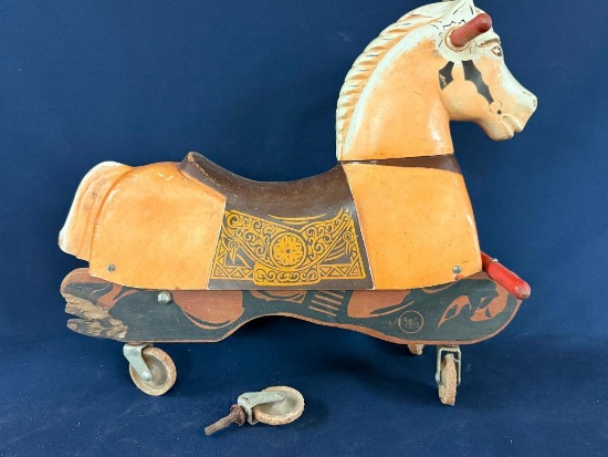 VINTAGE RIDING HORSE ON WHEELS
