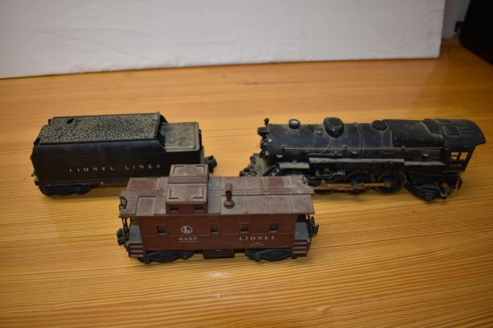 (3) Lionel zero scale model train cars; 675 engine, 6466 coal tender, 6457 caboose
