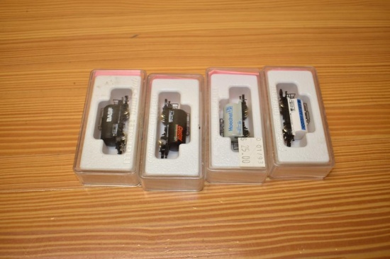 (4) Marklin Mini-club train cars- mostly tankers: