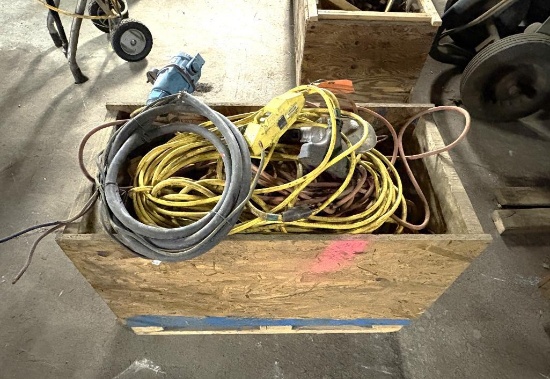 LOT WITH ASSORTED EXTENSION CORDS IN SMALL CRATE