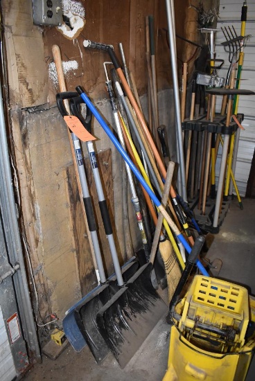 LOT W/ SNOW SHOVELS, SHOVELS, PICK, SLEDGE HAMMER, BROOMS, RAKES, ETC.