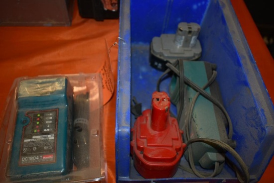 BIN WITH (2) MAKITA BATTERY CHARGERS AND (2) 18 VOLT BATTERIES