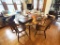 VINTAGE ETHAN ALLEN DINING TABLE AND FOUR CHAIRS. TABLE HAS EXTRA LEAF.