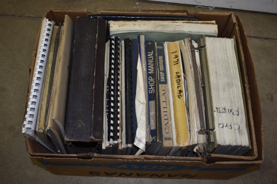 BOX WITH CAR PARTS MANUALS