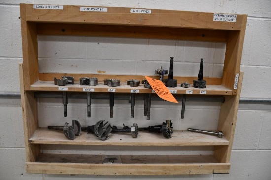 RACK WITH LARGE ASSORTMENT OF CONTRACTOR SPEED DRILL BITS