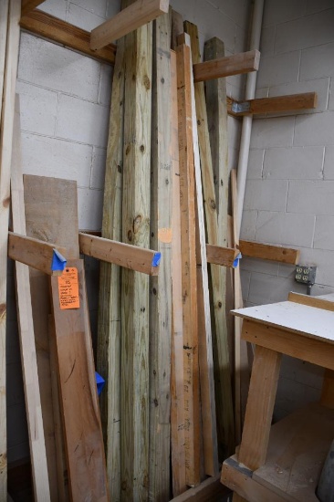 ASSORTED LUMBER IN THESE 3 SECTIONS; MOSTLY TREATED 4 X 4'S SOME HARDWOOOD AND MISC.