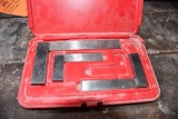 SET OF SPI STEEL SQUARES IN RED CASE. 1 OF 4 MISSING