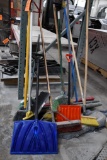 LARGE ASSORTMENT OF MOPS AND BROOMS AND EXTENSION POLES