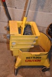 YELLOW MOP BUCKET AND MOP
