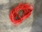 HEAVY DUTY ORANGE EXTENSION CORD, APPROX 60' PLUS- PICTURE IS REPRESENTATIVE