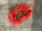 HEAVY DUTY ORANGE EXTENSION CORD, APPROX 60' PLUS- PICTURE IS REPRESENTATIVE