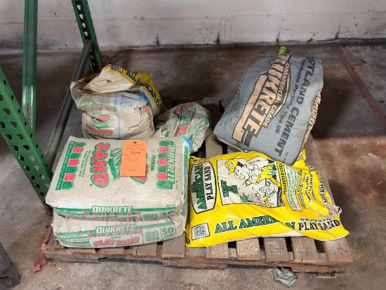 SKID W/ (2) FULL BAGS OF 50# QUIKCRETE PLAY SAND AND OTHER MISC PLAY SAND