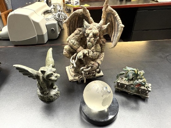 (2) GARGOYLE SCULPTURES (1) DRAGON SCULPTURE (1) GLASS BALL OF THE WORLD