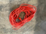 HEAVY DUTY ORANGE EXTENSION CORD, APPROX 60' PLUS- PICTURE IS REPRESENTATIVE