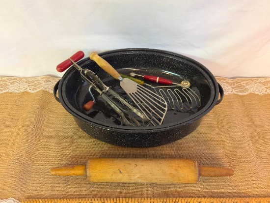 SPECKLED ROASTER LOADED WITH VINTAGE COOKING UTENSILS, ROLLING PINS, BEATERS, MORE