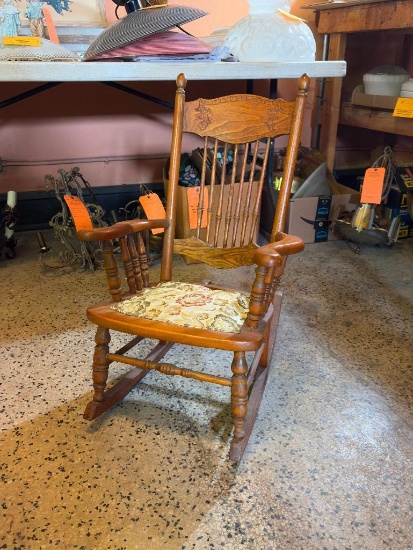 ANTIQUE CHILD'S PRESS BACK WOODEN ROCKER WITH CUSHIONED CLOTH SEAT, 29" TALL