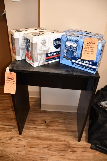 (4) CASES OF EMPTY SAMUEL ADAMS CANS & BLACK TABLE, 15" X 24" X 30"T