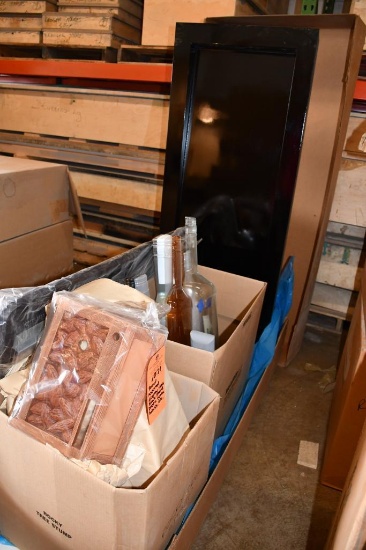 BOX OF ASSORTED DISPLAY ITEMS: BLACK STAND, PLASTIC BOTTLE HALVES, ETC.