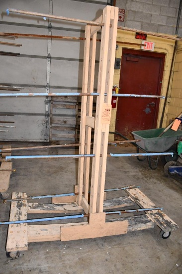 HOME MADE WOOD/METAL PIPE DRYING RACK, 4" CASTERS, 16 SECTIONS OF PIPE, 77"H X 58"L X 34"W