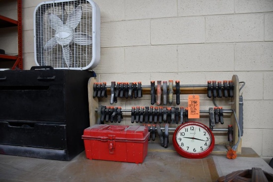 CONTENTS ON TOP SHELF OF BENCH: TOOLBOX, WALL CLOCK, HAND CLAMPS, HOME MADE ORGANIZER, FAN,