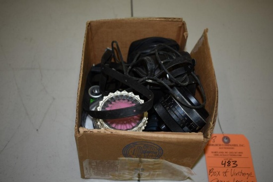 BOX OF VINTAGE CAMERA LENSES AND FILTERS AS SHOWN