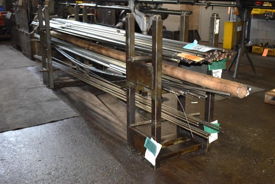 (4) STACKABLE STOCK STANDS WITH ASSORTED STOCK; MOST IS 12' LONG HEXAGON STOCK