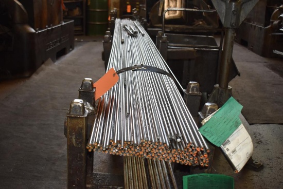 (6) STACKABLE STOCK STANDS WITH 3/8" 12' ROUND STOCK ON TOP, **NOT ALUMINUM**