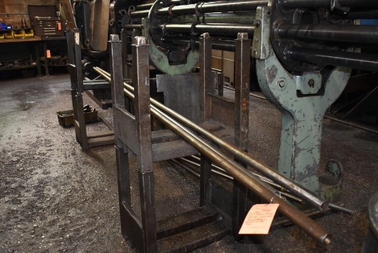 PAIR OF STEEL STOCK STANDS WITH CONTENTS; ROUND STOCK ON STAND & ON THE FLOOR