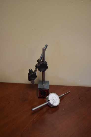 MITUTOYO 7011BN MAGNETIC STAND WITH ADJUSTABLE CLAMP HOLDING A DIAL TEST INDICATOR AND ADDITIONAL