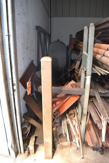ALL ASSORTED METAL ON FLOOR BETWEEN RACK AND WALL; ROUND STOCK, SHEET METAL AND MISC.