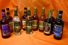 (12) ASSORTED BOTTLES OF ALCOHOL; WHISKEY, FLAVORED BRANDY, SLOE GIN & ASSORTED LIQUEURS