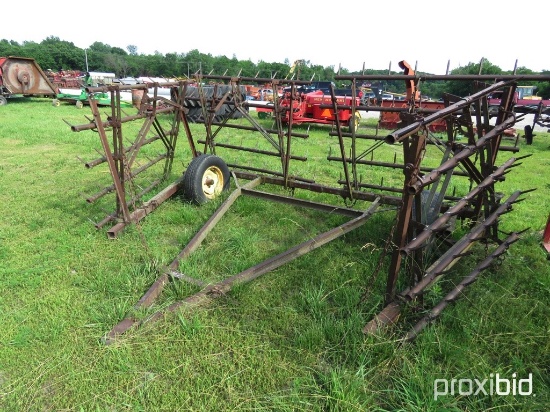 Folding section harrow on cart