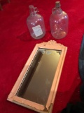 Antique etched mirror and water jugs