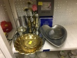 various metal dishes and vases