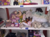 Shelf full of Dolls