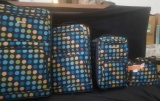 Rockland suitcase set. (3) suitcase & 1 bag polka dot (tear in large suitcase on side)