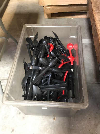 Tote of plastic serving utensils