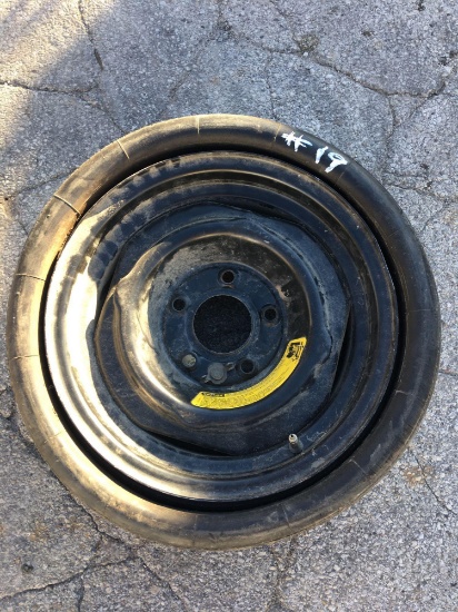 Antique GM space saver spare tire