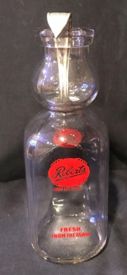 Robert's milk bottle. R on Bottom. With, cream top spoon.