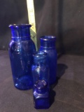 Blue medicine bottles