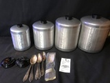 Vintage aluminum storage canisters, Reed and Barton spoon and Rockford spoons