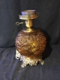 Vintage amber glass lamp marked F101 on base