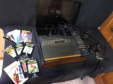 ATARI SYSTEM- 2600 WITH GAMES and Game program instructions!